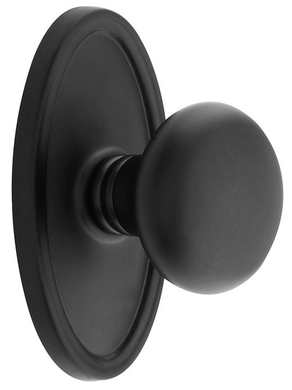 Oval Rosette Set With Providence Knobs in Flat Black.